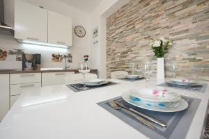 Kuchyň nebo kuchyňský kout v ubytování Apartment Carmen