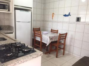 Virtuvė arba virtuvėlė apgyvendinimo įstaigoje Pousada Almeida