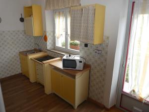 Køkken eller tekøkken på Appartamento a 1000 metri + 18 billeder