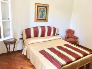 Postel nebo postele na pokoji v ubytování b&b le magnolie