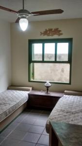 Postel nebo postele na pokoji v ubytování Casa em Toque Toque Pequeno + 11 fotografií