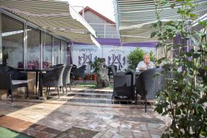 Posezení v ubytování Amethyst House Therme & Bucharest Otopeni Airport