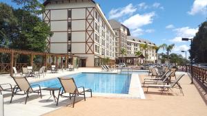 The swimming pool at or close to Flat Vista Azul - Pedra Azul ES