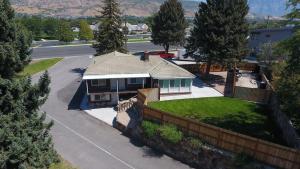 an aerial view of a house with a fence at The Lindon House in Lindon