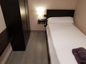 Postel nebo postele na pokoji v ubytování Casa Carol