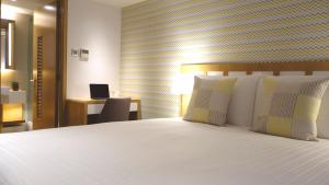 Uma cama ou camas num quarto em Shama Island North