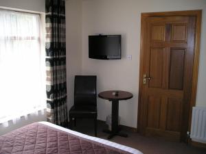 TV a/nebo společenská místnost v ubytování Mountain View Guesthouse