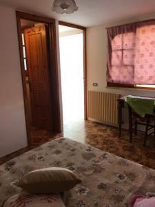 A bed or beds in a room at Casa Vacanza GICO'