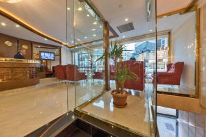 Posezení v ubytování Marcello Hotel