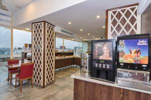 Kuchyň nebo kuchyňský kout v ubytování Marcello Hotel