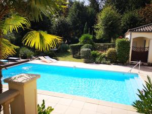The swimming pool at or near Le Mas des Geais