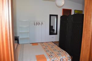 Postel nebo postele na pokoji v ubytování Estudio Rural La Rosa Herrera