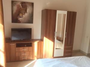 A bed or beds in a room at Villa Flora Lavenda