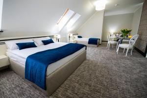 Cama o camas de una habitación en Aparthotel Kontrast