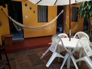 Patio nebo venkovní prostory v ubytování Pousada Caravelas