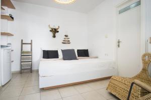 Posteľ alebo postele v izbe v ubytovaní Urban Beach Studio