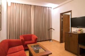 TV a/nebo společenská místnost v ubytování Lemon Tree Hotel Alwar