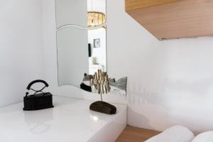 Posteľ alebo postele v izbe v ubytovaní Urban Beach Studio