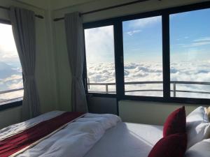 Katil atau katil-katil dalam bilik di Hotel Pristine Himalaya