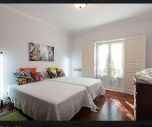 
A bed or beds in a room at Stunning view Alcobaça
