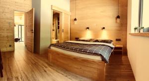 
Posteľ alebo postele v izbe v ubytovaní Chalet Slovensky Raj
