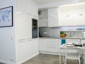 Cuisine ou kitchenette dans l'établissement Apartament Skoczyńskiego 11a