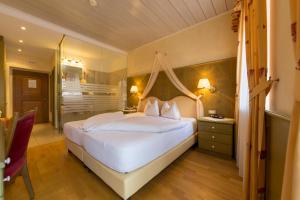 Letto o letti in una camera di Hotel Weisses Lamm