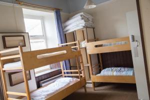 Postel nebo postele na pokoji v ubytování Kirkby Stephen Hostel