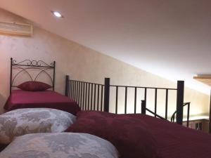 Cama o camas de una habitación en Marielle Maison