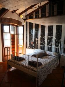 Postel nebo postele na pokoji v ubytování B&B Il Martin Pescatore