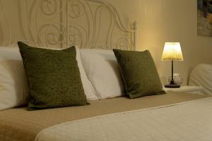 Posteľ alebo postele v izbe v ubytovaní Xenía B&B