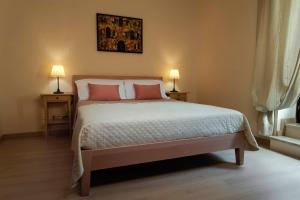 Posteľ alebo postele v izbe v ubytovaní Xenía B&B