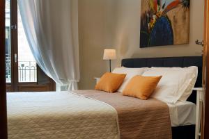 Posteľ alebo postele v izbe v ubytovaní Xenía B&B