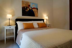 Posteľ alebo postele v izbe v ubytovaní Xenía B&B