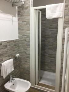 Koupelna v ubytování Hotel Malpensafiera