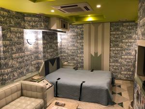 Postel nebo postele na pokoji v ubytování Hotel Charbon (Adult Only)