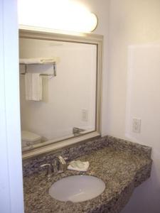 Kylpyhuone majoituspaikassa All Seasons Lodge