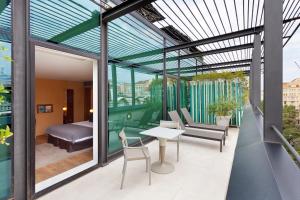 A balcony or terrace at Hotel Condes de Barcelona