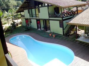 
The swimming pool at or near Pousada Pedra Porosa
