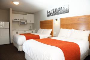 Postel nebo postele na pokoji v ubytování Chateau Motel + 9 fotografií