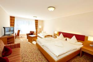 Postel nebo postele na pokoji v ubytování Hotel Hochheide