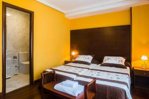 Cama o camas de una habitación en Pension ARCA