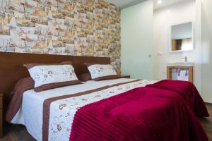 Cama o camas de una habitación en Pension ARCA
