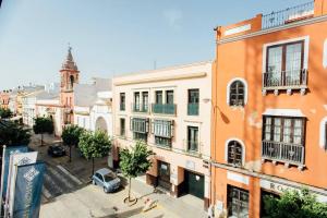 Photo de la galerie de l'établissement Precioso apartamento en el casco antiguo de Triana, à Séville