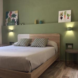 Postel nebo postele na pokoji v ubytování B&B Radici