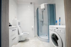 Kúpeľňa v ubytovaní FUDA APARTAMENT BRUKSELSKA 11