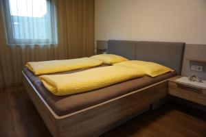 A bed or beds in a room at Klösterle 2018