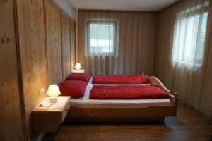A bed or beds in a room at Klösterle 2018