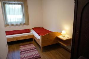 A bed or beds in a room at Klösterle 2018