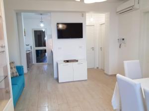 A television and/or entertainment centre at Le Villette - Taormina